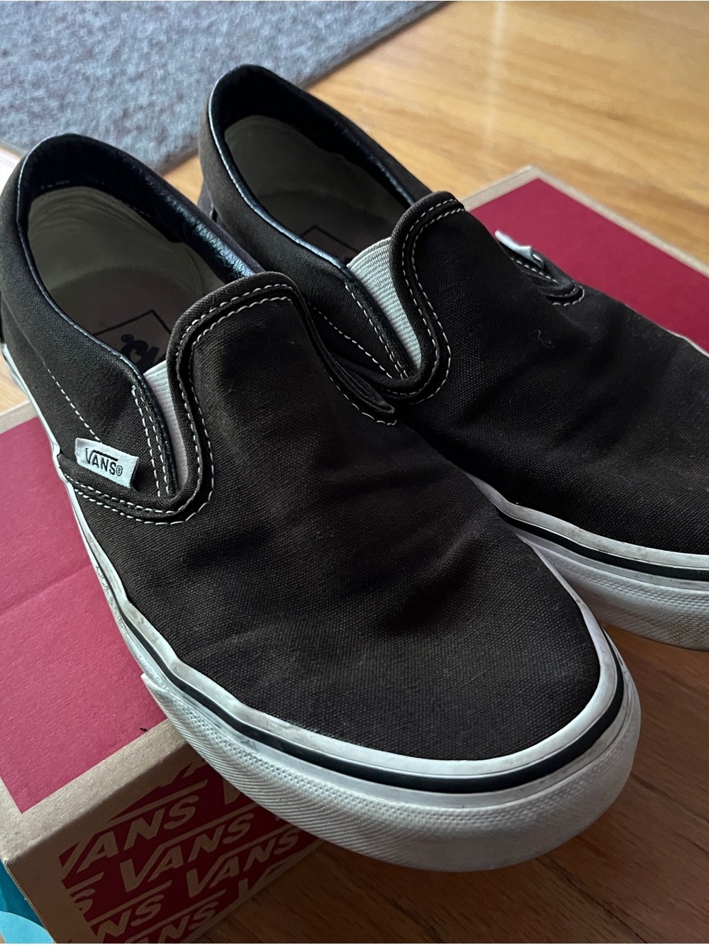Vans Slip-On Sneakers in Black and White Canvas